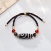 red string nine-eye dzi bracelet