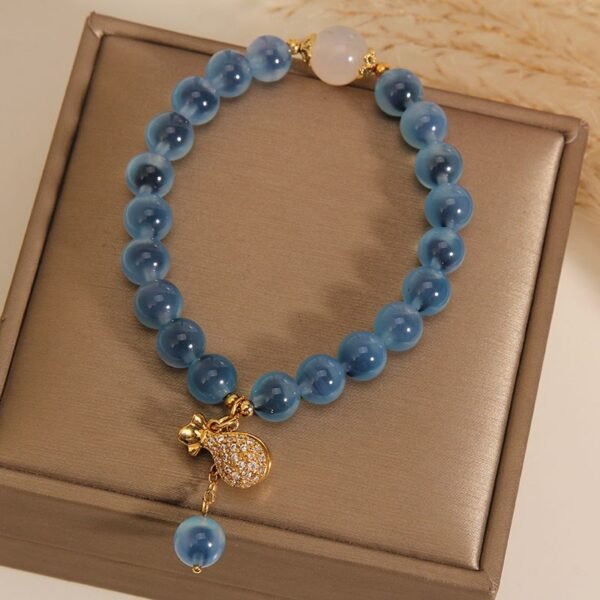 Blue Agate Bracelet with Luck Pouch Charm - Wealth & Good Fortune