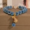 Blue Agate Bracelet with Luck Pouch Charm - Wealth & Good Fortune