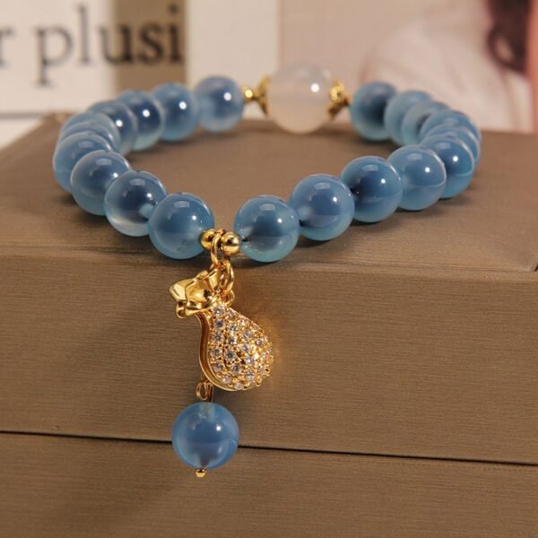 Blue Agate Bracelet with Luck Pouch Charm - Wealth & Good Fortune