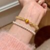 Rutilated Quartz bracelet 3 Rutilated Quartz Tigers Eye Bracelet with Coin Charm for Wealth & Opportunity