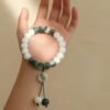 Bodhi Seed Bracelet with Peace Pendant