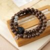lion dance 2 Sandalwood Silver Obsidian Awakening Lion Bracelet for Protection & Courage